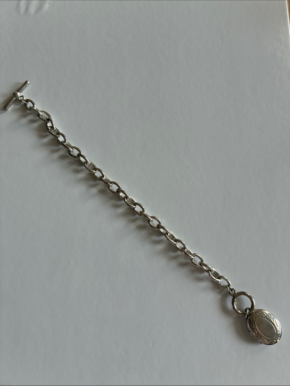 Juicy Couture Silver Toggle Chain Bracelet with Engraved Oval Locket